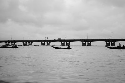 Bridge over river against sky