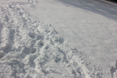 High angle view of snow covered land
