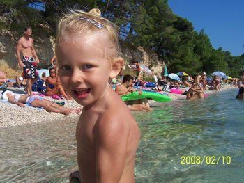 Portrait of a boy swimming in pool