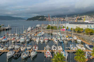 High angle view of boats moored in harbor