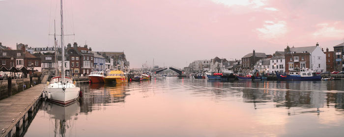 Boats moored in sea