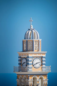 Clock tower against blue sky