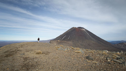 Scenic view of arid landscape against sky