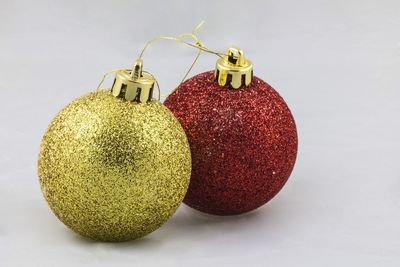 Close-up of christmas decoration against white background