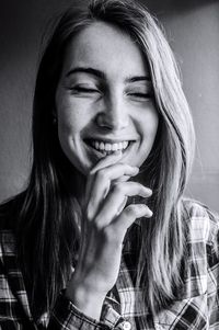 Close-up of young woman smiling