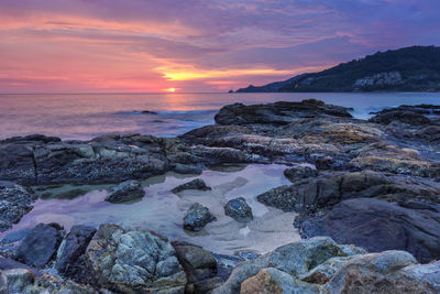 Scenic view of sea against sky during sunset