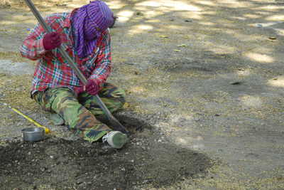 High angle view of man working on field