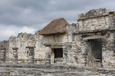 Low angle view of old ruin against sky