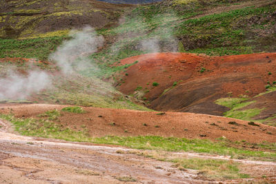 Geothermal active zone in hveragerdi, iceland with volcanic hot spring, fumarola