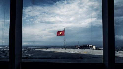 Cloudy sky seen through window