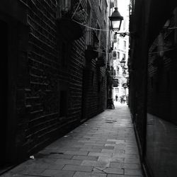 Narrow alley with buildings in background