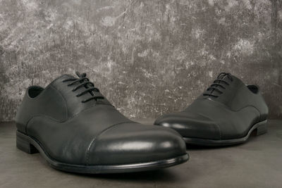 High angle view of shoes on water