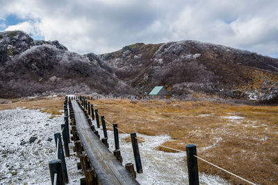 Scenic view of snow mountains against sky