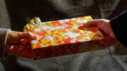 Midsection of person holding ice cream