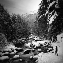 People standing on snow covered mountain