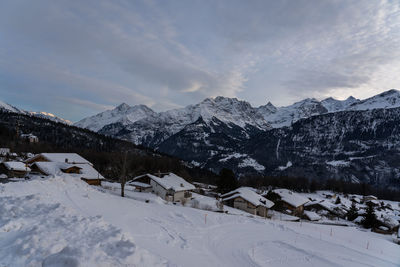 Scenic view of snowcapped mountains against sky