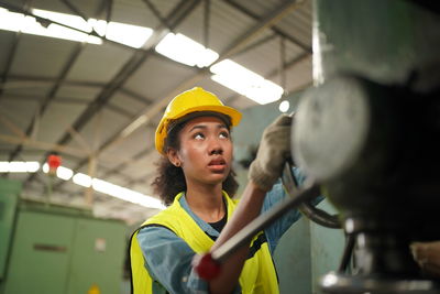 Portrait of man working at construction site