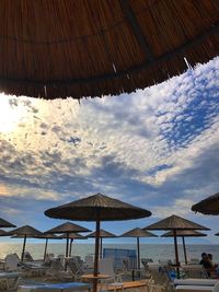 Built structure on beach against sky