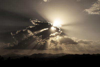 Silhouette of landscape against sky