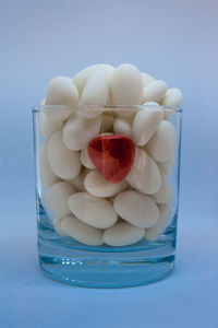 Close-up of eggs over white background