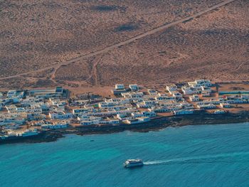 High angle view of sailboats in sea