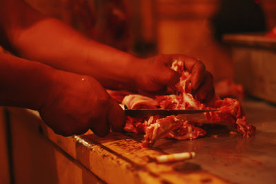 Midsection of person preparing food