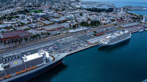 High angle view of sea amidst buildings in city