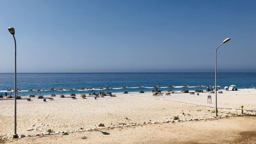 Scenic view of beach against clear sky