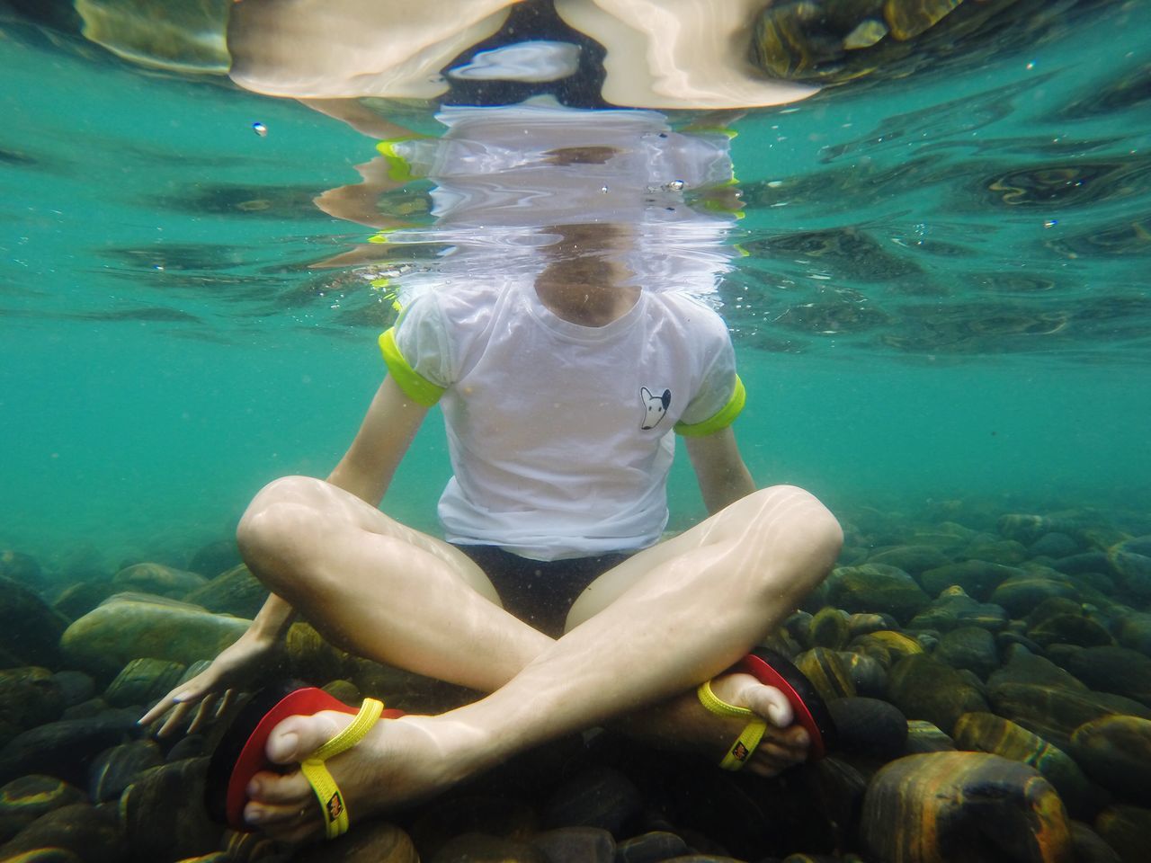 water, swimming, underwater, leisure activity, lifestyles, fish, undersea, full length, childhood, sea, high angle view, shirtless, swimming pool, blue, transparent, sea life, waterfront, person