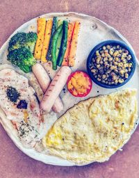 High angle view of breakfast served on table