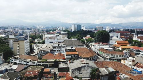 High angle shot of townscape against sky