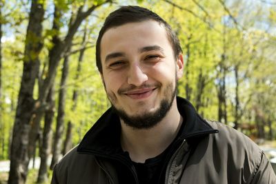 Close-up portrait of happy young man