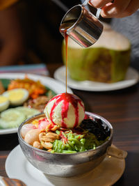 Close-up of fruits in bowl on table