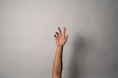 Midsection of person against white background