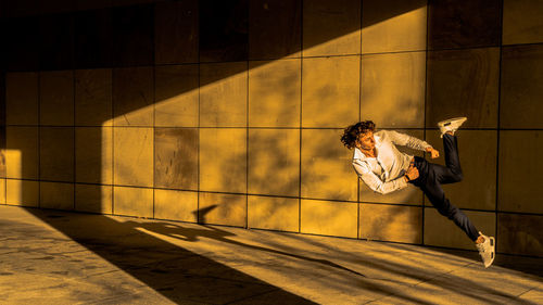 Shadow of woman on wall