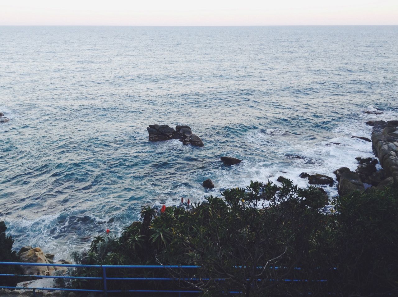 sea, water, horizon over water, tranquil scene, scenics, tranquility, beauty in nature, nature, high angle view, idyllic, seascape, sky, rippled, coastline, blue, shore, beach, rock - object, ocean, day