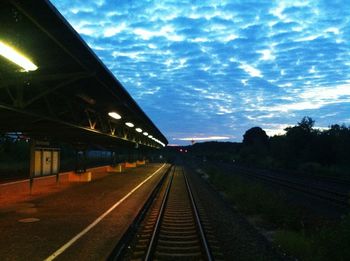 Railroad track at railroad station platform