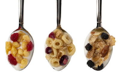 Close-up of fruits against white background