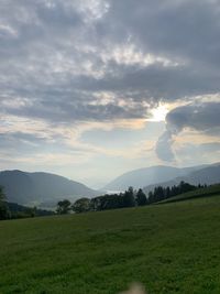 Scenic view of field against sky