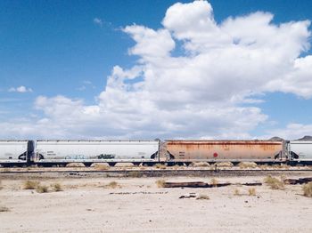 View of train against cloudy sky