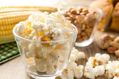 Close-up of popcorns in container on table