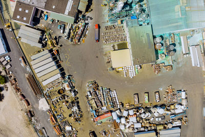 High angle view of commercial dock by factory