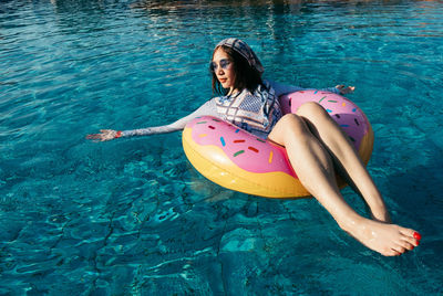 Young woman in swimming pool