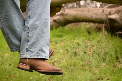 Man standing on grassy field