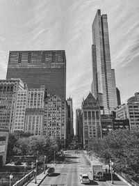 Modern buildings against sky in city