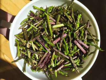 High angle view of chopped vegetables in bowl on table