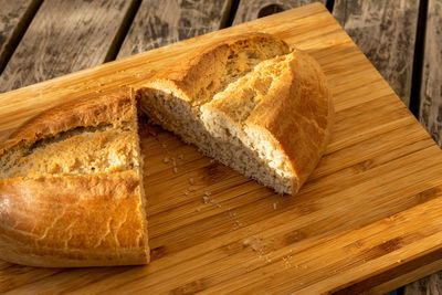 High angle view of bread on cutting board