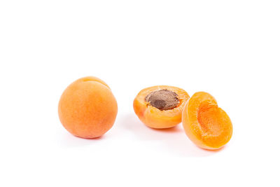 Close-up of orange against white background