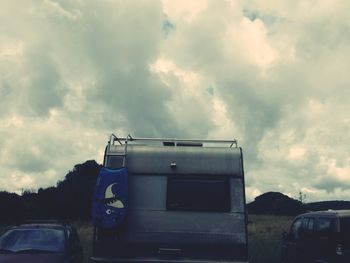 View of car against cloudy sky