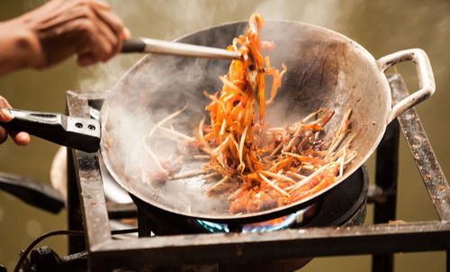 Close-up of person preparing food